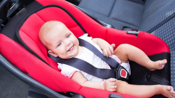 Woman Baby Seats In The Car Seat